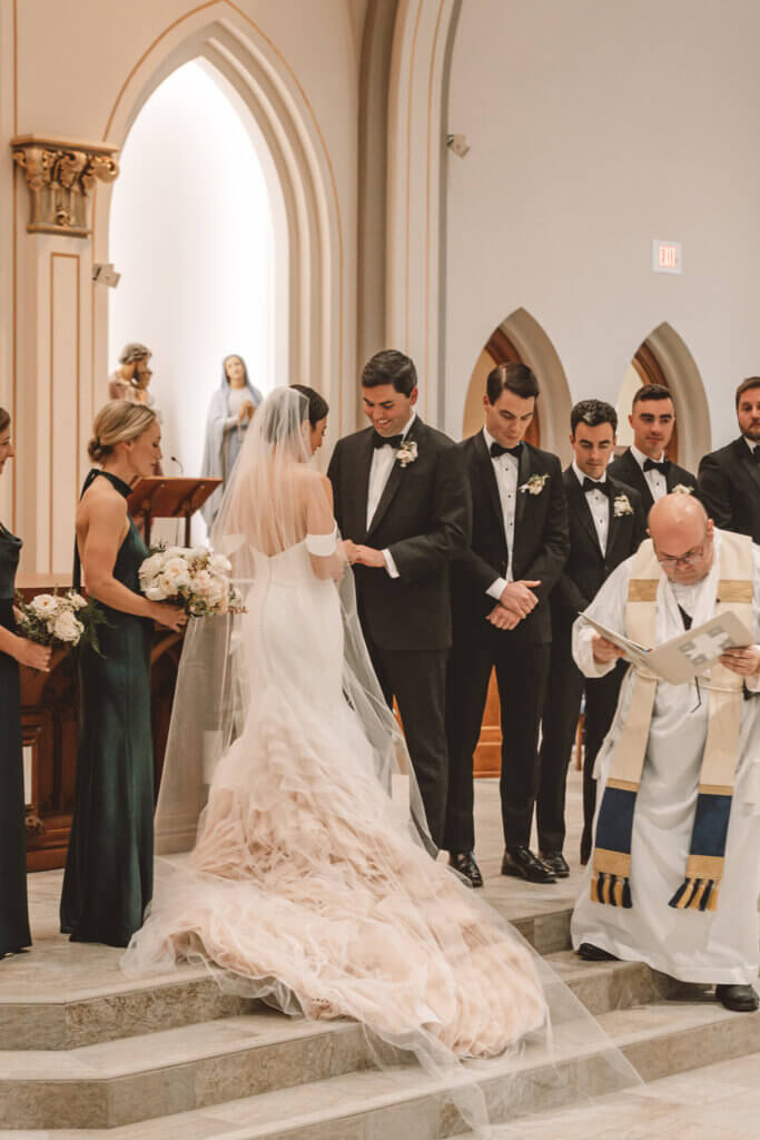 Bride and Groom exchanging rings during their fall wedding in Bozeman, MT.