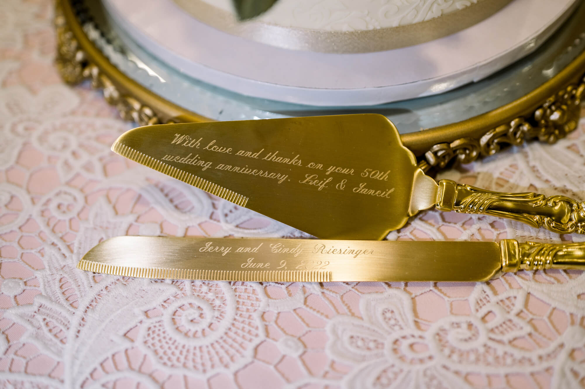 Celebrating 50 Years of Love: Our Parents' Golden Anniversary 28 Custom gold engraved cake knife and server for a 50th wedding anniversary.