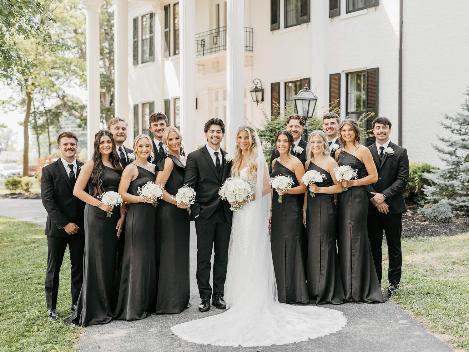 Black and White Wedding Invitations for a Classic Ashford Acres Inn Wedding 10 roup photo of full bridal party in black and white attire, posed in front of the historic Ashford Acres Inn mansion.