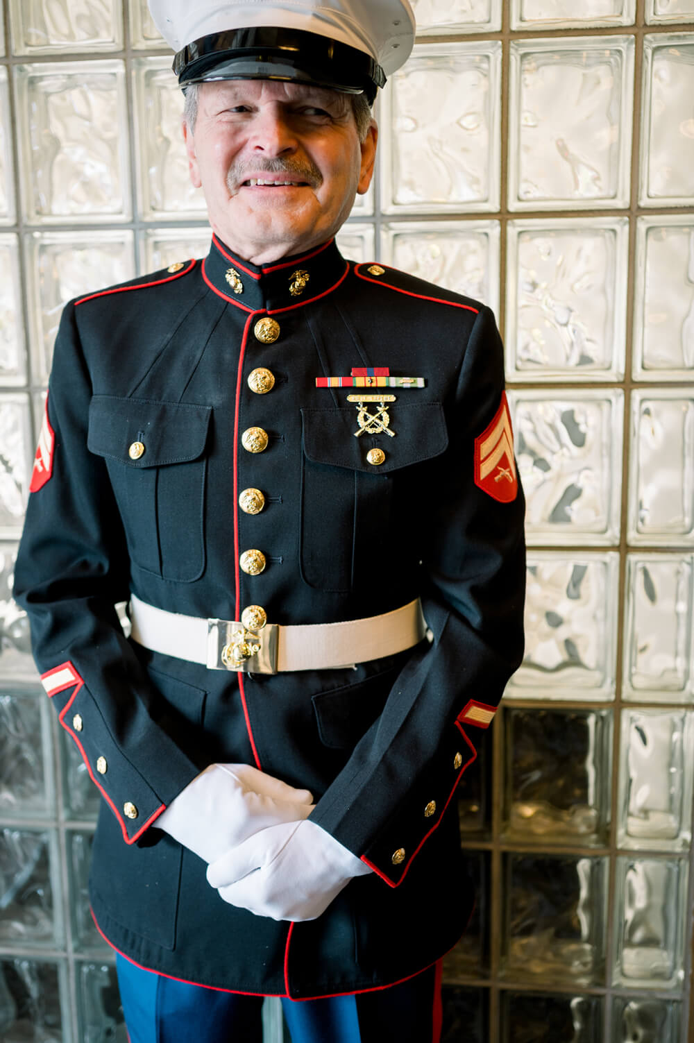 Celebrating 50 Years of Love: Our Parents' Golden Anniversary 31 Portrait of the father of the couple in full Marine Corps dress blues at their 50th anniversary event.