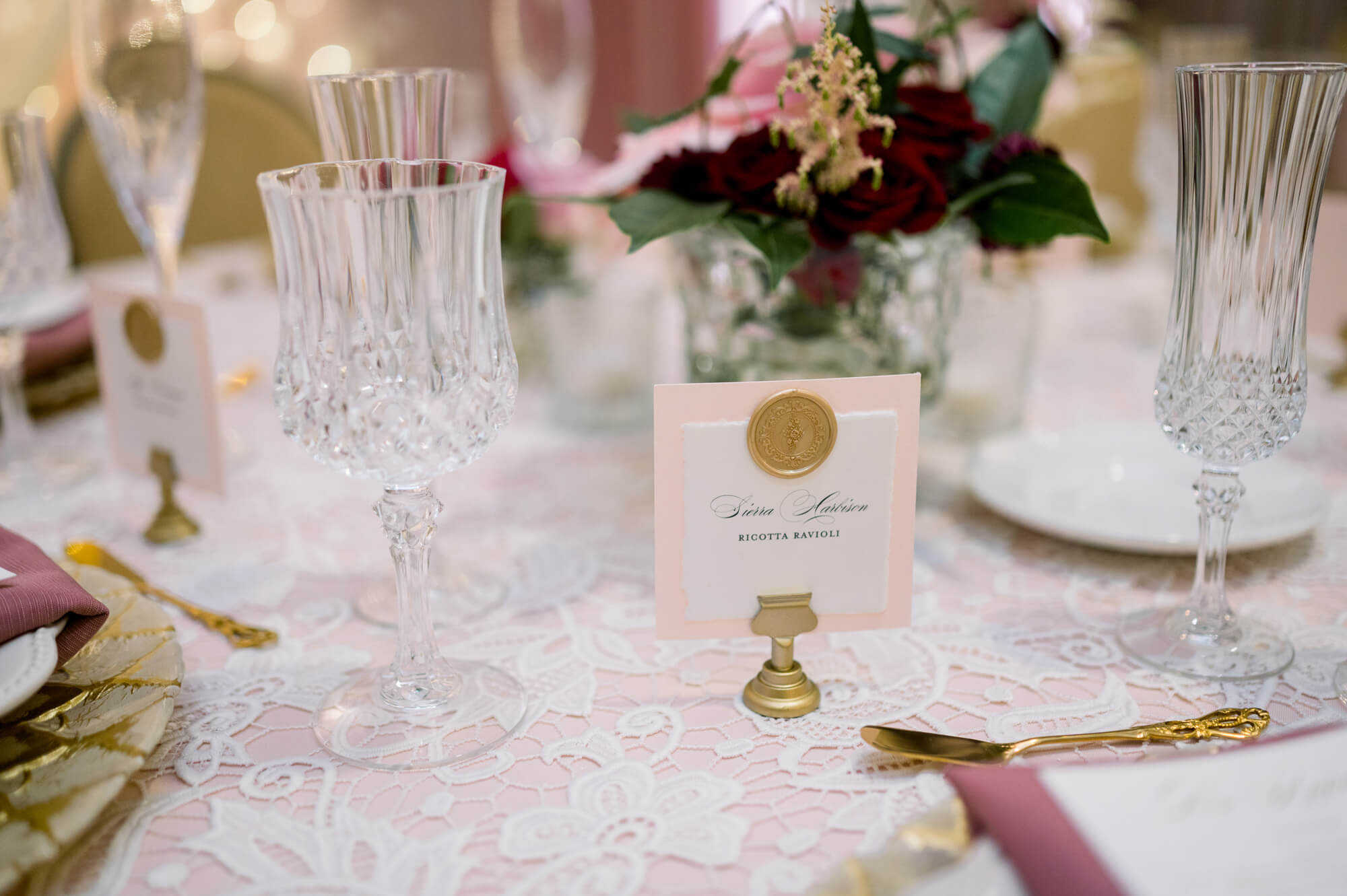 Celebrating 50 Years of Love: Our Parents' Golden Anniversary 12 Gold wax seal place card with crystal glassware and vintage gold flatware, for romantic 50th wedding anniversary.